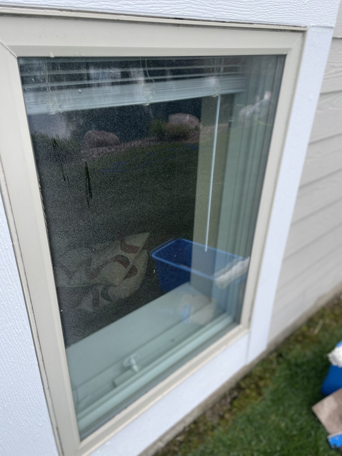 Dirty window before TLC Bros cleaning